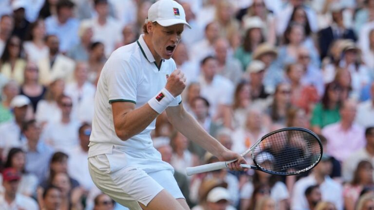 Jannik Sinner of Italy celebrates after winning a point against Alexander Zverev of Germany men's singles final at Wimbledon Tennis Championships in London, Sunday, July 12, 2026. (AP Photo/Kin Cheung)