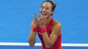 Zheng Qinwen, of China, celebrates after winning the women's singles final match against a Mirra Andreeva, of Russia at the China Open tennis tournament in Beijing, Sunday, Oct. 11, 2026. (AP Photo/Andy Wong)