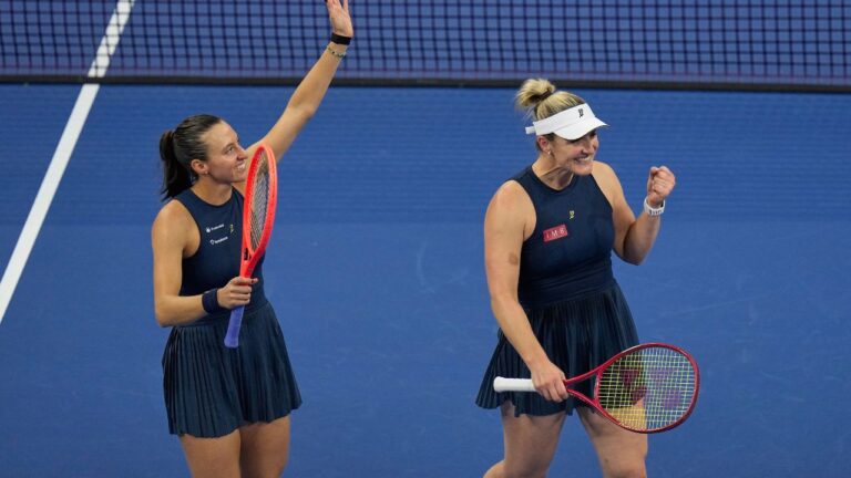 Gabriela Dabrowski, of Canada, and Luisa Stefani, of Brazil celebrate after winning the women's doubles final match against Katerina Siniakova, of the Czech Republic, and Zhang Shuai, of China at the China Open tennis tournament in Beijing, Sunday, Oct. 11, 2026. (AP Photo/Andy Wong)