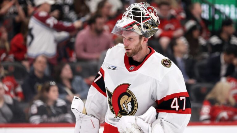 Ottawa Senators goaltender James Reimer reacts during a break in play in the third period of an NHL hockey game against the New Jersey Devils, Sunday, April 12, 2026, in Newark, N.J. (AP Photo/Adam Hunger)