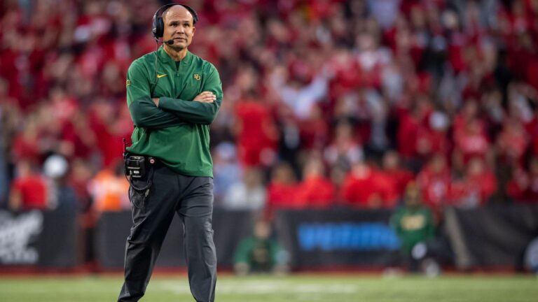 Baylor head coach Dave Aranda walks on the field during a timeout during the third quarter of an NCAA college football game against Cincinnati, Saturday, Oct. 25, 2025, in Cincinnati. (AP Photo/Tanner Pearson)
