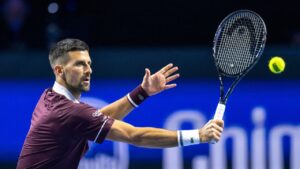 Serbia's Novak Djokovic plays a return during his round of sixteen match against Germany's Jan-Lennard Struff at the Swiss Indoors tennis tournament in Basel, Switzerland, Thursday Oct. 29, 2026. (Georgios Kefalas/Keystone via AP)