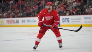 Detroit Red Wings center Dylan Larkin (71) plays against the Seattle Kraken in the first period of an NHL hockey game Friday, Oct. 9, 2026, in Detroit. (AP Photo/Paul Sancya)