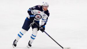 Winnipeg Jets left wing Kyle Connor controls the puck during an NHL hockey game against the Dallas Stars Thursday, April 2, 2026, in Dallas. (Tony Gutierrez/AP)