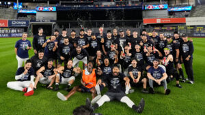 The New York Yankees take a group photo on the field to celebrate after winning baseball's American League wild-card series against the Boston Red Sox in Game 2, Wednesday, Sept. 30, 2026, in New York. (Yuki Iwamura/AP)
