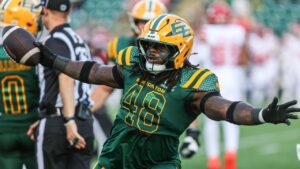 Edmonton Elks' Nick Anderson (48) celebrates a turnover against the Calgary Stampeders during first half CFL football action in Edmonton on Saturday, Sept. 12, 2026. (Codie McLachlan/THE CANADIAN PRESS)