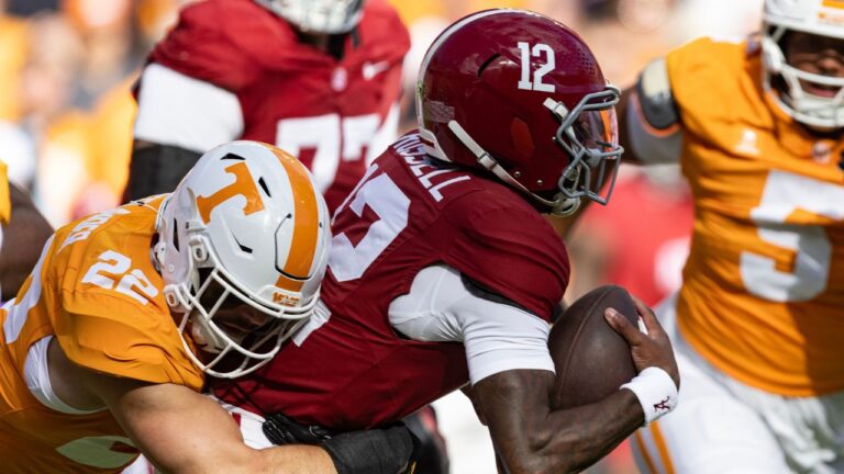 Alabama quarterback Keelon Russell (12) is sacked by Tennessee linebacker Jeremiah Telander (22) during the first half an NCAA college football game Saturday, Oct. 17, 2026, in Knoxville, Tenn. (Wade Payne/AP Photo)