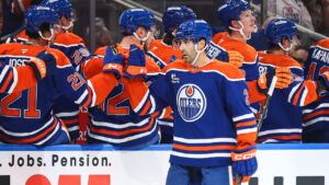 Edmonton Oilers' Evan Bouchard (2) celebrates a goal against the Vancouver Canucks during first period NHL hockey action in Edmonton on Tuesday, Sept. 29, 2026. (Codie McLachlan/CP)