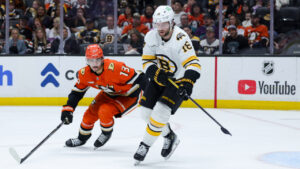 Boston Bruins center Pavel Zacha, right, moves the puck against Anaheim Ducks center Nikita Nesterenko during the second period of an NHL hockey game Friday, Oct. 16, 2026 in Anaheim, Calif. (Ryan Sun/AP)