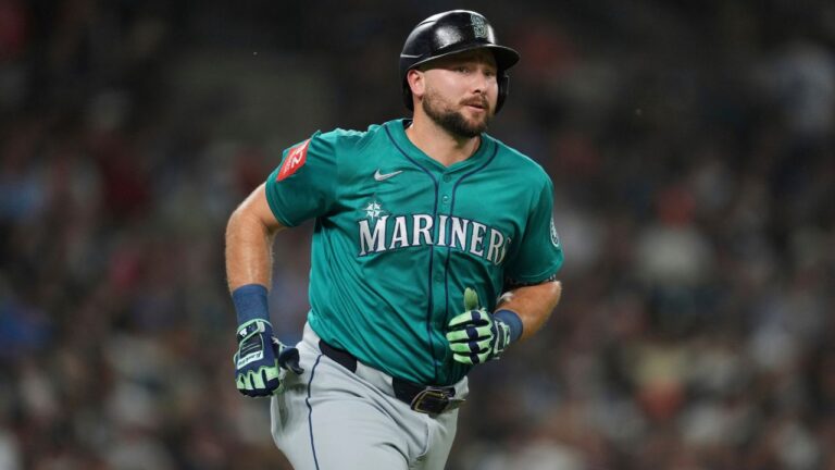 Seattle Mariners' Cal Raleigh rounds first base after hitting a grand slam against the Detroit Tigers in the ninth inning during a baseball game, Friday, July 11, 2025, in Detroit. (Paul Sancya/AP)