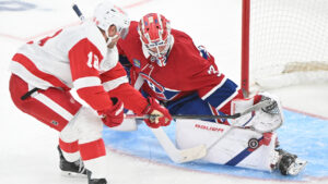Montreal Canadiens goaltender Jacob Fowler (32) stops Detroit Red Wings' Andrew Copp (18) during third period NHL hockey action in Montreal on Saturday, Oct. 10, 2026. (Graham Hughes/CP)