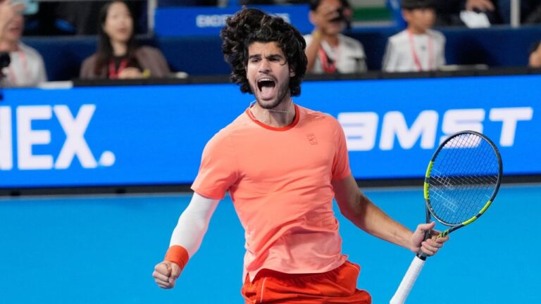 Spain's Carlos Alcaraz celebrates after winning the men's singles final against Czechia's Jiri Lehecka at the Japan Open tennis tournament in Tokyo, Tuesday, Oct. 6, 2026. (Eugene Hoshiko/AP)