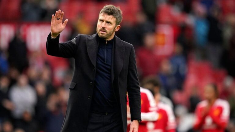 Manchester United's head coach Michael Carrick waves to supporters after his team lost the English Premier League soccer match between Manchester United and Bournemouth in Manchester, England, Sunday, Oct. 25, 2026. (Dave Thompson/AP)