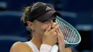 Alina Charaeva, of Armenia, reacts after defeating Elena Rybakina, of Kazakhstan, in the second round of the women's singles match during the China Open tennis tournament. (Ng Han Guan/AP)