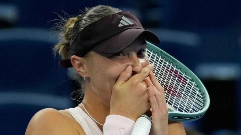 Alina Charaeva, of Armenia, reacts after defeating Elena Rybakina, of Kazakhstan, in the second round of the women's singles match during the China Open tennis tournament. (Ng Han Guan/AP)