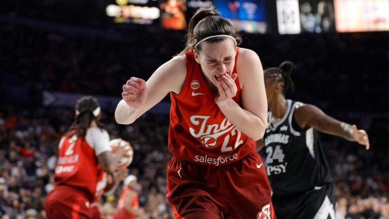 Indiana Fever guard Caitlin Clark (22) reacts after being hurt on a play during the second half in Game 3 of an WNBA basketball first-round playoff series against the Las Vegas Aces, Thursday, Oct. 1, 2026, in Las Vegas. (Steve Marcus./AP Photo)