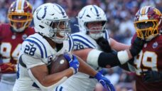 Taylor runs for two TDs as Colts beat Commanders in London