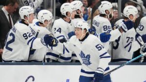 Toronto Maple Leafs right wing Easton Cowan (53) celebrates his goal in the second period of an NHL hockey game against the Columbus Blue Jackets in Columbus, Ohio, Tuesday, October. 20, 2026. (Sue Ogrocki/AP Photo)