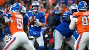 Seattle Seahawks quarterback Sam Darnold looks to pass against the Denver Broncos during the first half of an NFL football game in Denver, Thursday, Oct. 15, 2026. (Geneva Heffernan/AP)