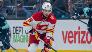 Calgary Flames forward Jonathan Castagna skates with the puck during a preseason NHL hockey game against the Seattle Kraken, Thursday, Sept. 24, 2026, in Seattle. (Stephen Brashear/AP)