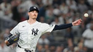 New York Yankees starting pitcher Max Fried throws out Boston Red Sox's Trevor Story at first base during the third inning in Game 2 of baseball's American League Wild Card Series, Wednesday, Sept. 30, 2026, in New York. (Yuki Iwamura/AP)