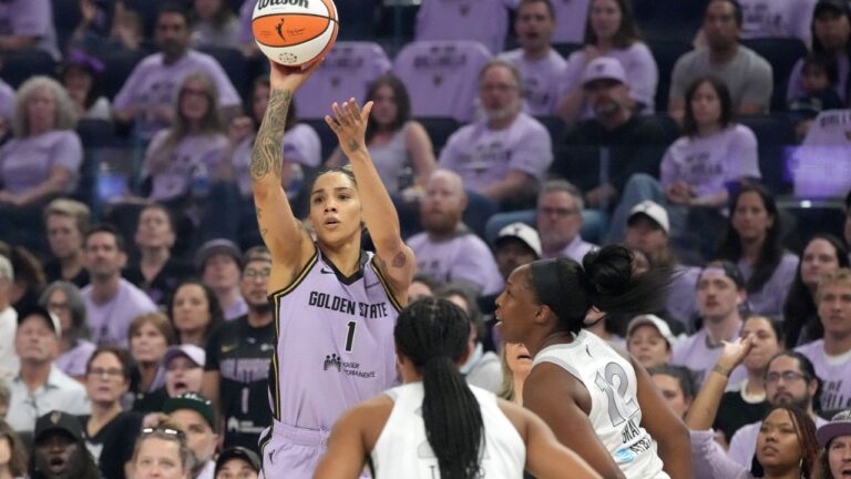 Golden State Valkyries forward Gabby Williams (1) shoots a three-point basket against Las Vegas Aces guard Chelsea Gray (12) during the first half of Game 1 of the WNBA basketball semifinals in San Francisco, Sunday, Oct. 4, 2026. (Tony Avelar/AP)