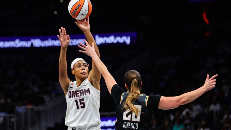 Atlanta Dream guard Allisha Gray (15) shoots against New York Liberty guard Sabrina Ionescu, right, during the first half of Game 1 of the WNBA basketball semifinals, Sunday, Oct. 4, 2026, in Atlanta. (Colin Hubbard/AP)