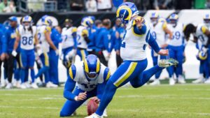 Los Angeles Rams kicker Harrison Mevis (92) kicks the extra point with with punter Ethan Evans (42) spotting the ball during an NFL football game in Philadelphia, Sunday, Oct. 4, 2026. (Chris Szagola/AP)