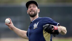 Milwaukee Brewers’ Jim Henderson throws during a spring training baseball workout Sunday, Feb. 22, 2015, in Phoenix. Morry Gash/AP Photo)