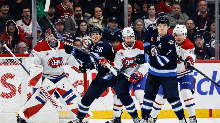 Winnipeg Jets' Vladislav Namestnikov (7) tips the puck towards Montreal Canadiens goaltender Samuel Montembeault (35) during first period NHL action in Winnipeg, Wednesday, Feb. 4, 2026. (John Woods/CP)