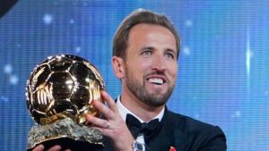 England's soccer player Harry Kane holds the player of the year trophy during the Ballon d'Or ceremony at the London Palladium Theatre in London, England, Monday, Oct. 26, 2026 . (Kin Cheung/AP)