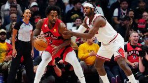 Toronto Raptors' Kawhi Leonard (2) protects the ball from Chicago Bulls' Buddy Hield (7) during first half NBA basketball action in Toronto on Wednesday, Oct. 21, 2026. (Frank Gunn/CP)