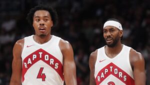 Toronto Raptors forward Scottie Barnes (4) and forward Kawhi Leonard (2) during a break in first half pre-season NBA basketball action against the New York Knicks in Toronto on Tuesday, Oct. 13, 2026. (Nathan Denette/CP)