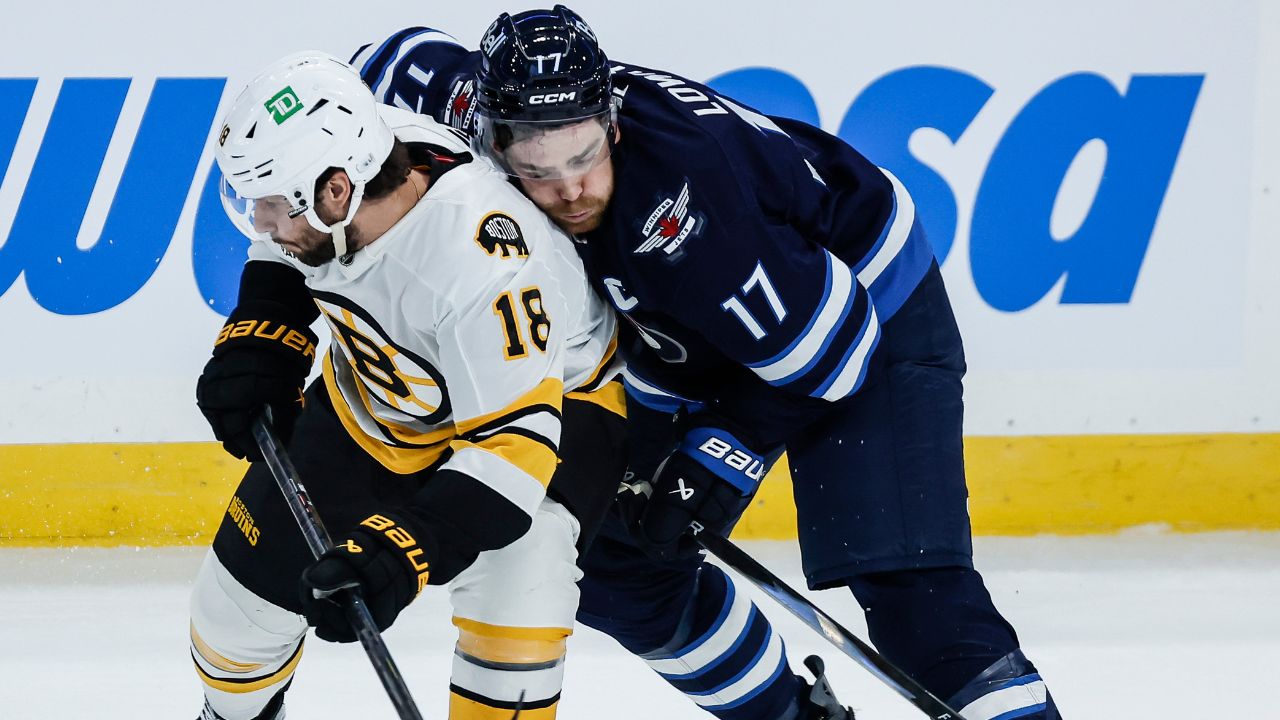 Jets lose in overtime to Bruins in season opener