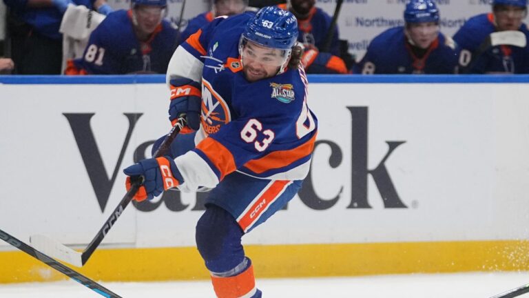 New York Islanders' Matias Maccelli (63) shoots the puck during the second period of an NHL hockey game against the Vancouver Canucks Tuesday, Oct. 13, 2026, in Elmont, N.Y. (Frank Franklin II/AP Photo)