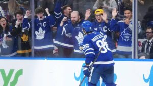 Toronto Maple Leafs' Kirill Marchenko (86) celebrates his hat trick goal against the Buffalo Sabres during second period NHL hockey action in Toronto on Thursday, Oct. 15, 2026. (Nathan Denette/CP)
