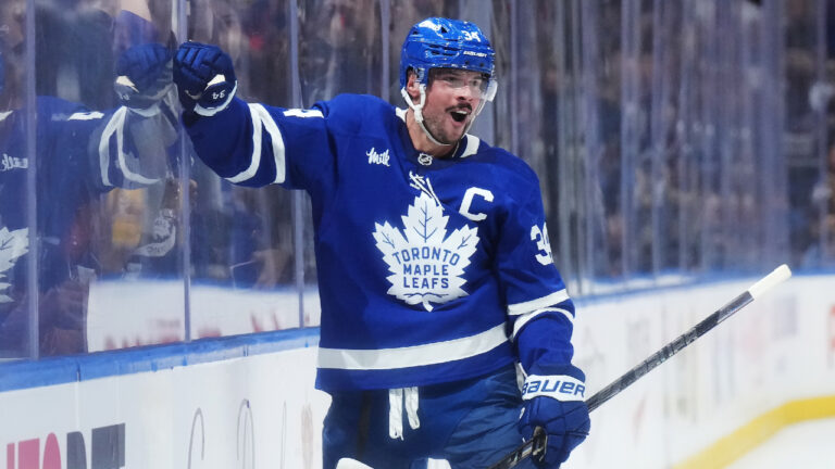 Toronto Maple Leafs' Auston Matthews (34) celebrates his game-winning goal against the Nashville Predators in overtime NHL hockey action in Toronto on Tuesday, Oct. 6, 2026. (Nathan Denette/CP)