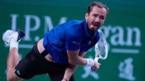 Daniil Medvedev, of Russia, serves to Stefanos Tsitsipas, of Greece, during the fourth round of the men's singles match at the Shanghai Masters tennis tournament in Shanghai, China, Wednesday, Oct. 14, 2026. (Andy Wong/AP Photo)