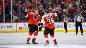 Philadelphia Flyers' Matvei Michkov (39) celebrates his goal with Porter Martone during the first period of an NHL hockey game against the Anaheim Ducks, Saturday, Oct. 24, 2026, in Philadelphia. (Derik Hamilton/AP)