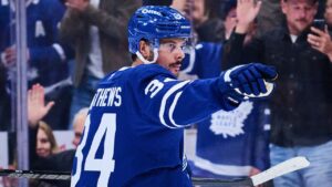 Toronto Maple Leafs' Auston Matthews (34) celebrates after scoring against the San Jose Sharks during second period NHL hockey action in Toronto, on Monday, Oct. 19, 2026. (Sammy Kogan/THE CANADIAN PRESS)