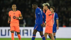 PSG's Ousmane Dembele, centre, leaves the field with an injury during the Champions League opening phase soccer match between Paris Saint-Germain and FC Barcelona in Paris, Tuesday, Oct. 20, 2026. (Thibault Camus/AP)