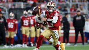 San Francisco 49ers quarterback Brock Purdy (13) scrambles while pressured against the Washington Commanders during the first half of an NFL football game in Santa Clara, Calif., Monday, Oct. 19, 2026. (Jed Jacobsohn/AP)