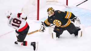Ottawa Senators' Tim Stützle (18) scores against Boston Bruins' Jeremy Swayman, right, during the first period of an NHL hockey game, Monday, Oct. 5, 2026, in Boston. (Charles Krupa/AP)