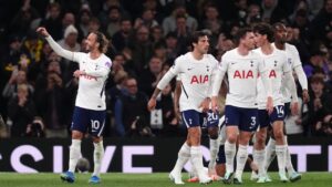 Tottenham Hotspur's James Maddison, left, celebrates scoring during the English Premier League soccer match between Tottenham Hotspur and Coventry City in London, Monday Oct. 19, 2026. (John Walton/PA via AP)