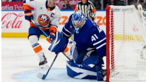 Toronto Maple Leafs goaltender Anthony Stolarz (41) makes a save as New York Islanders' Bo Horvat (14) looks for the rebound during first period NHL hockey action in Toronto on Wednesday, Sept. 30, 2026. (Frank Gunn/CP)