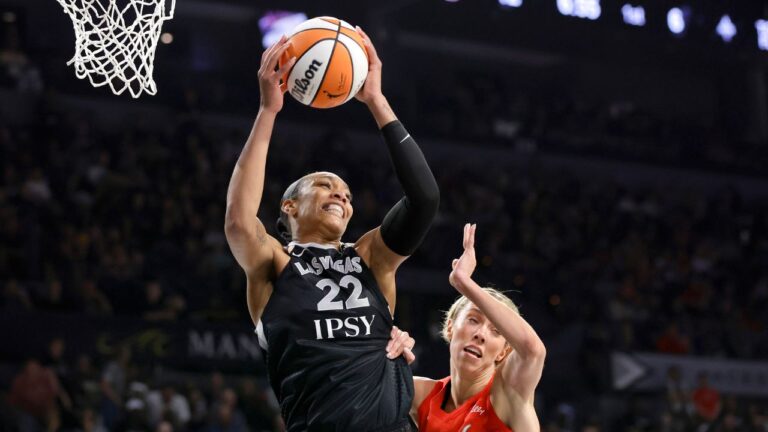 Las Vegas Aces centre A'ja Wilson (22) pulls down a rebound by Indiana Fever guard Lexie Hull (10) during the first half in Game 3 of an WNBA basketball first-round playoff series Thursday, Oct.1, 2026, in Las Vegas. (Steve Marcus/AP Photo)
